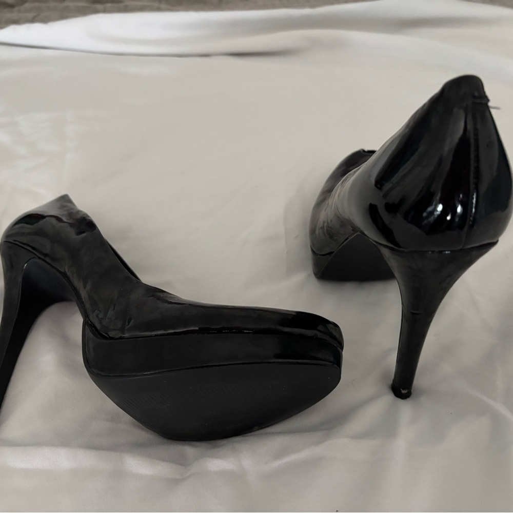Black patent leather peep toe heels